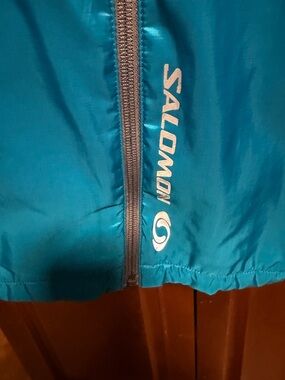 Salomon Grey Jacket with Blue Logo Tag